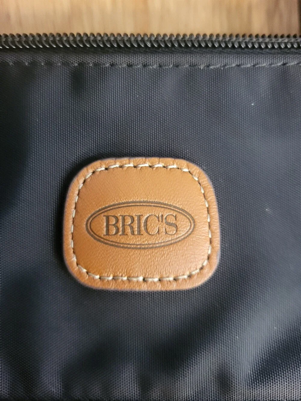Bric's Milano Black Luxury X-collection Commuter Tote with Tan Leather Handles.